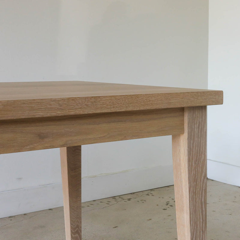 Extendable Slim Tapered Leg Dining Table Pictured in White Oak  Natural