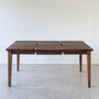 Extendable Slim Tapered Leg Dining Table Pictured in Walnut Clear - Leaf Insert