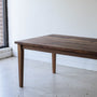 Extendable Slim Tapered Leg Dining Table Pictured in Walnut Clear