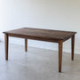 Extendable Slim Tapered Leg Dining Table Pictured in Walnut Clear