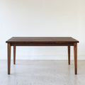 Extendable Slim Tapered Leg Dining Table Pictured in Walnut Clear