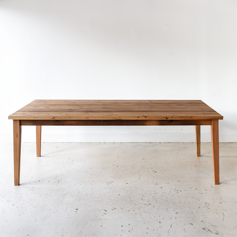 Slim Tapered Leg Dining Table Pictured In Reclaimed Oak Clear