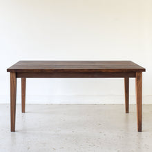 Slim Tapered Leg Dining Table Pictured In Walnut Clear