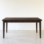 Slim Tapered Leg Dining Table Pictured In White Oak Black