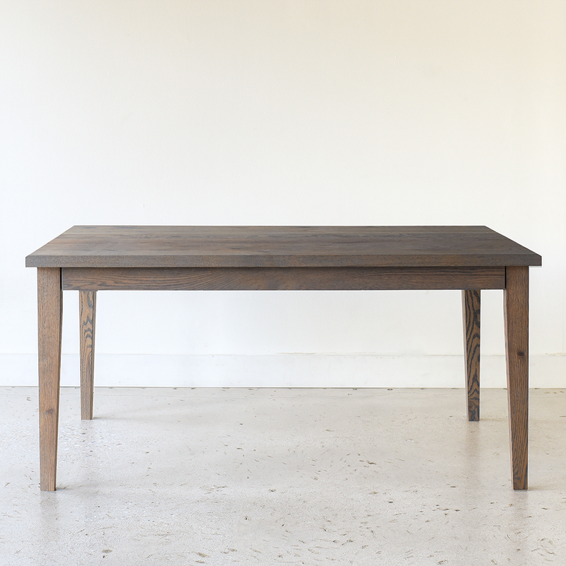 Slim Tapered Leg Dining Table Pictured In White Oak Gray