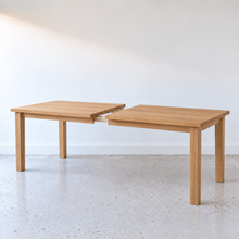 Farmhouse Extendable Dining Table, Parsons style Pictured In White Oak Clear.