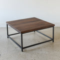 Square Stoic Coffee Table Pictured in Walnut Clear &amp; Blackened Metal