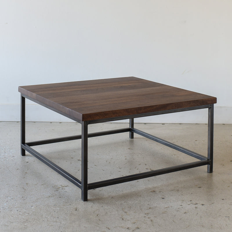 Square Stoic Coffee Table Pictured in Walnut Clear &amp; Blackened Metal