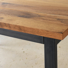 Close up of the blackened steel apron and legs on the Industrial Plank Extendable Dining Table in Reclaimed Oak Clear &amp; Blackened Metal Base