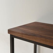 Stoic Wood Console Table Pictured In Walnut Clear &amp; Blackened Metal