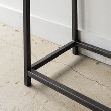 Stoic Wood Console Table Pictured In Walnut Clear &amp; Blackened Metal - close up leg detail