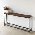 Stoic Wood Console Table Pictured In Walnut Clear &amp; Blackened Metal