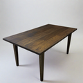 Slim Tapered Leg Dining Table Pictured in White Oak Black