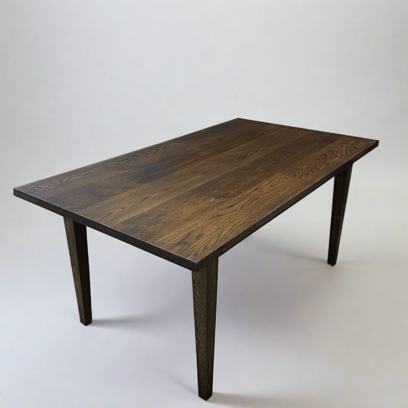 Slim Tapered Leg Dining Table Pictured in White Oak Black