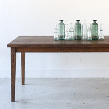 Slim Tapered Leg Dining Table Pictured in Reclaimed Oak Walnut 