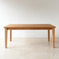 Plank Tapered Leg Dining Table pictured in White Oak Clear 