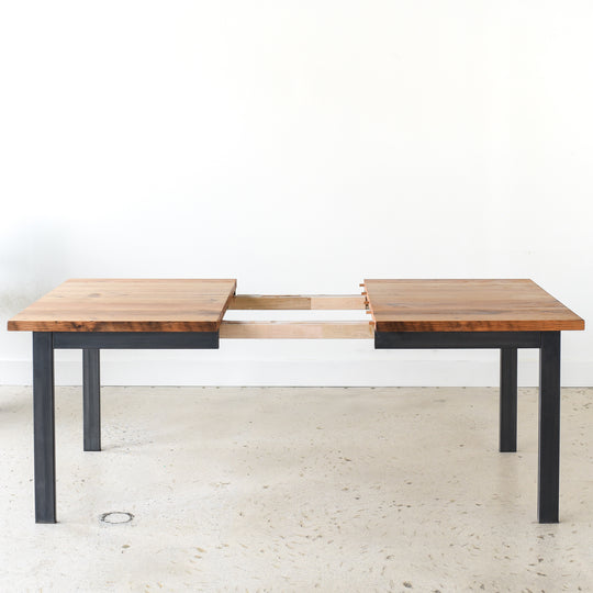 Industrial Plank Extendable Dining Table in Reclaimed Oak / Clear and Blackened Metal Base
