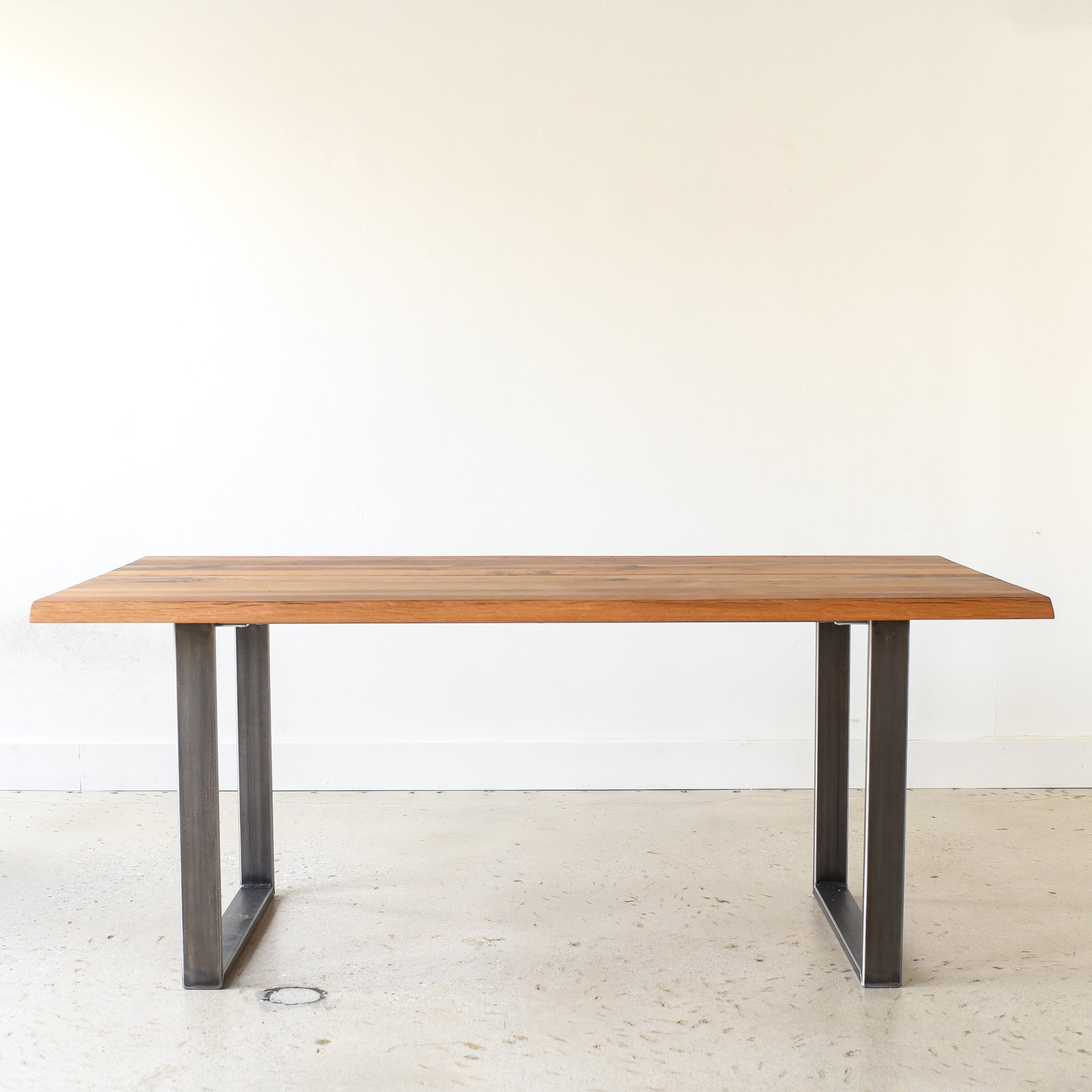 Live Edge Modern Dining Table in Reclaimed Oak / Clear & Blackened Steel 'U-Shaped' Legs