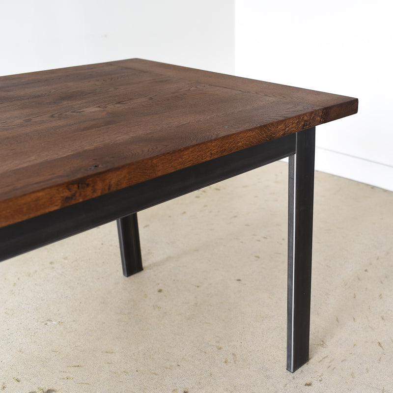 Steel Frame Dining Table in Reclaimed Oak / Walnut Finish and Blackened Metal Legs - Close up of steel apron and legs