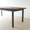 Steel Frame Dining Table - Side view of steel apron and legs, pictured in Reclaimed Oak / Walnut &amp; Blackened Metal