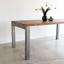 Pictured in Reclaimed Oak / Clear &amp; Silver Metal Legs