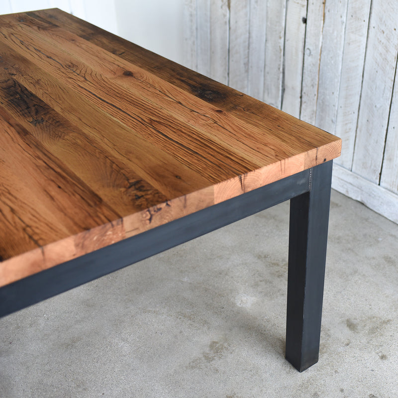 Wide Steel Frame Dining Table - Close-up detail of tabletop. Pictured in Reclaimed Oak / Clear &amp; Blackened Metal Legs