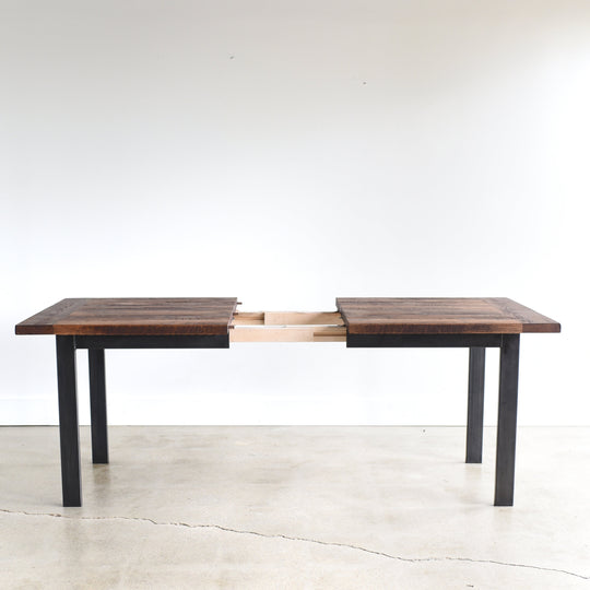 Steel Frame Extendable Dining Table - Open View. Pictured in Reclaimed Oak / Walnut & Blackened Metal Legs