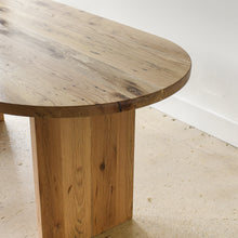 Modern Timber Oval Dining Table - Close up view of side profile. Pictured in Reclaimed Oak / Clear