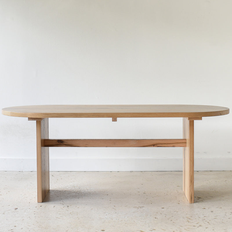 Modern Timber Oval Dining Table - Front View, Pictured in Reclaimed Oak / Clear