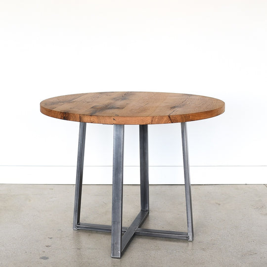 Round Criss Cross Base Dining Table in Reclaimed Oak / Clear  & Blackened Metal