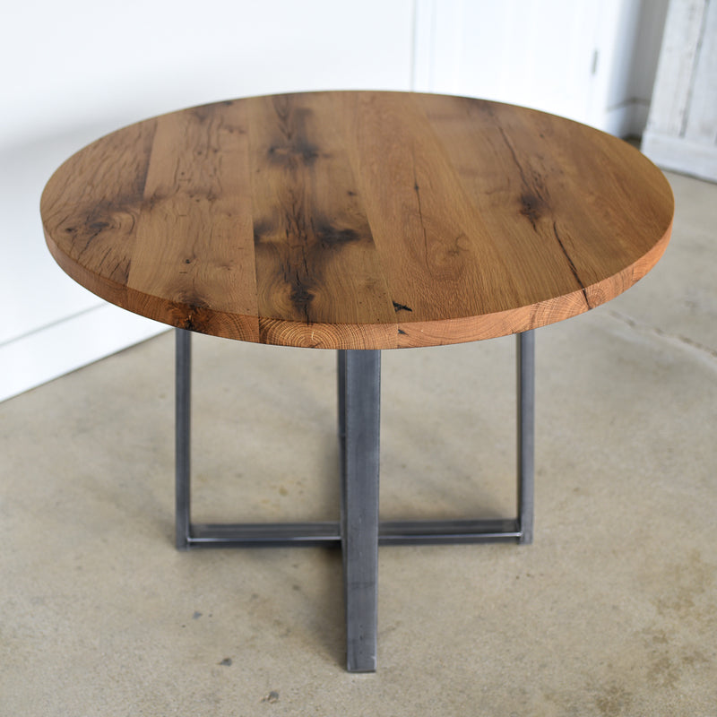 Round Criss Cross Base Dining Table in Reclaimed Oak / Clear and  &amp; Blackened Metal