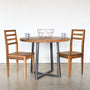 Round Criss Cross Base Dining Table paired with our &lt;a href=&quot;https://wwmake.com/products/reclaimed-wood-dining-chairs-barnwood-dining-chairs&quot;&gt; Farmhouse Wood Dining Chairs&lt;/a&gt; in Reclaimed Oak / Clear  &amp; Blackened Metal
