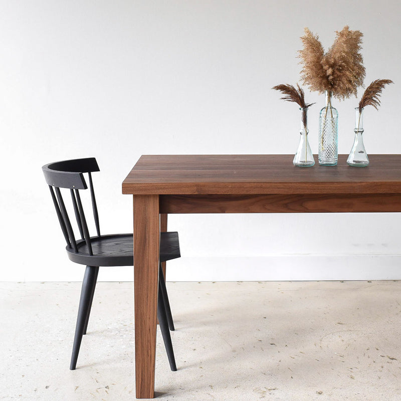 Extendable Tapered Leg Dining Table Pictured in Walnut / Clear Featured with our &lt;a href=&quot;/products/modern-windsor-chair&quot;&gt; Modern Windsor Chair&lt;/a&gt; in Blackened Oak